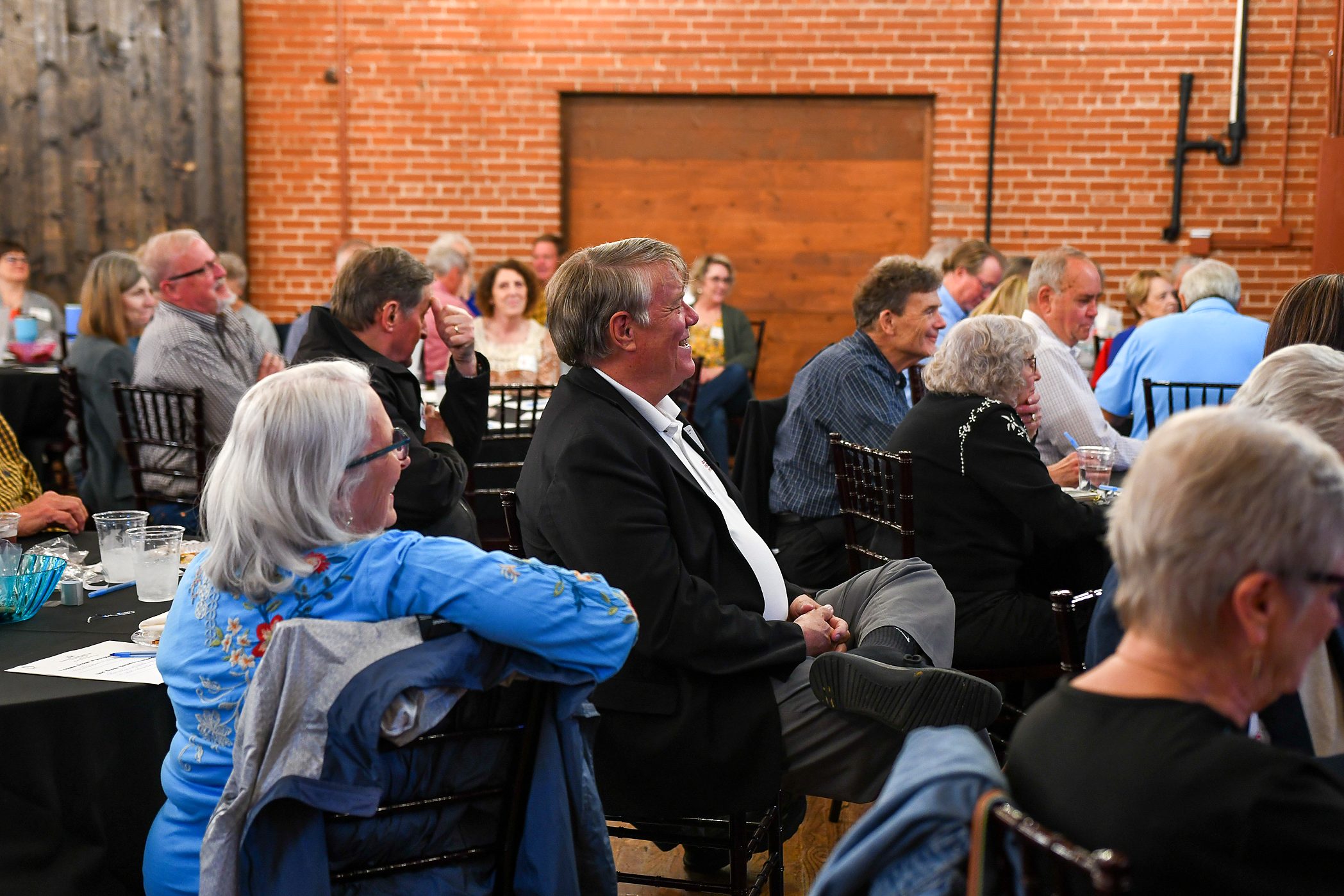 Guests at an education session at a firm event